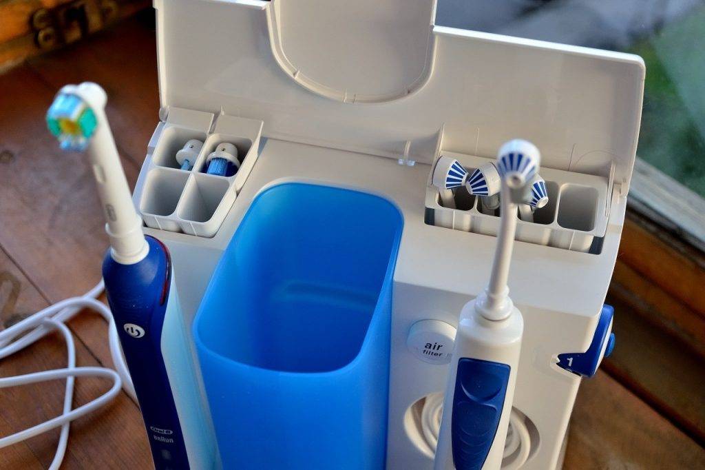Обзор электрической зубной щетки с ирригатором - как работает устройство и правила использования