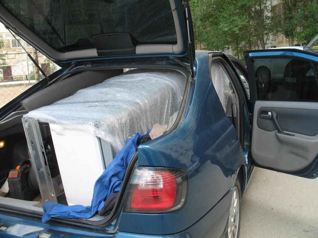 Перевозка стиральной машины в легковом автомобиле